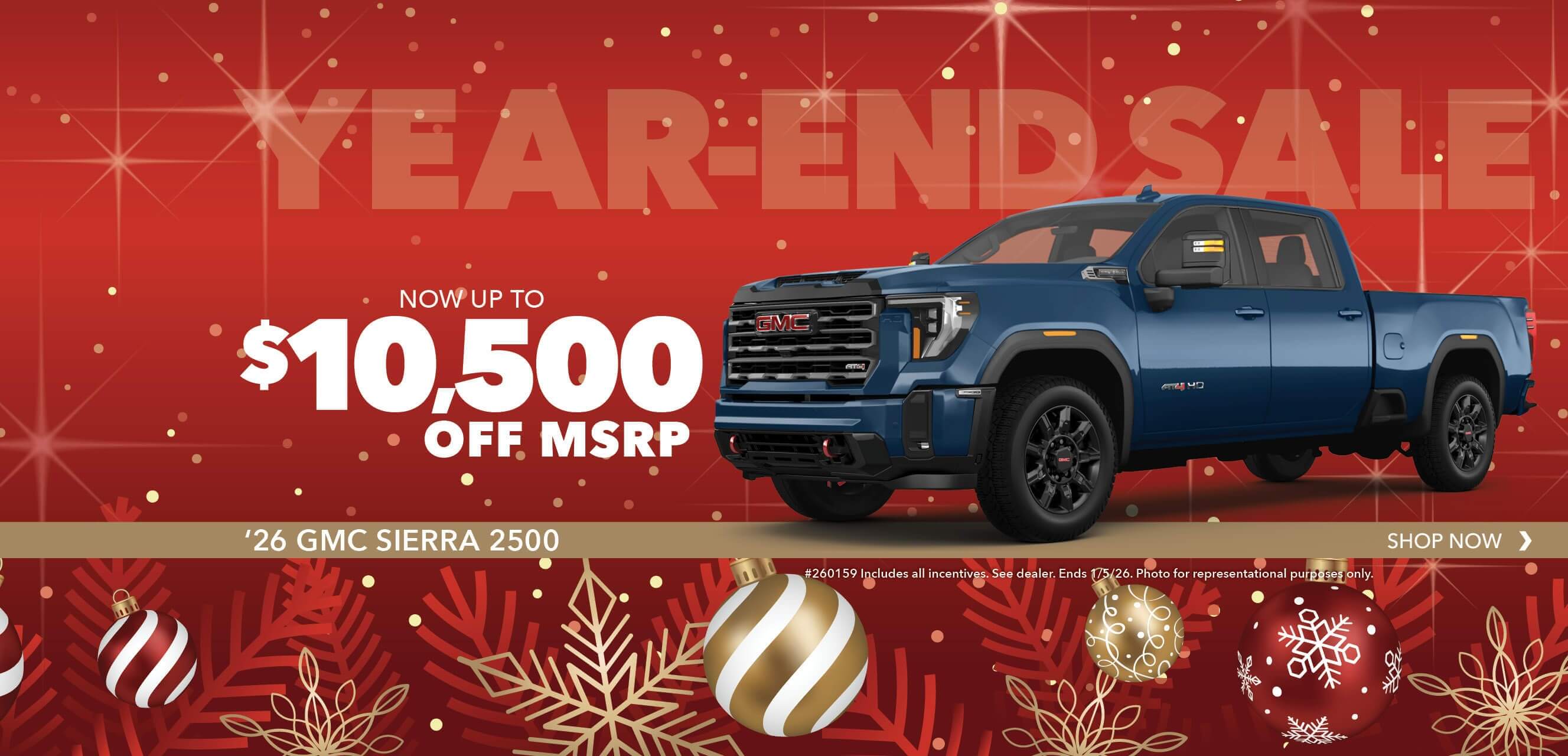 Blue truck with advertising slogans:  Now up to $10,500 off MSRP on 2026 GMC Sierra 2500.